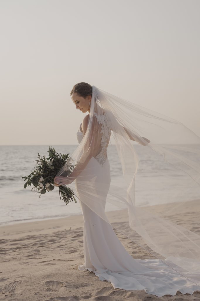 Cape Cod Massachusetts wedding photographer captures brides portraits on the beach.