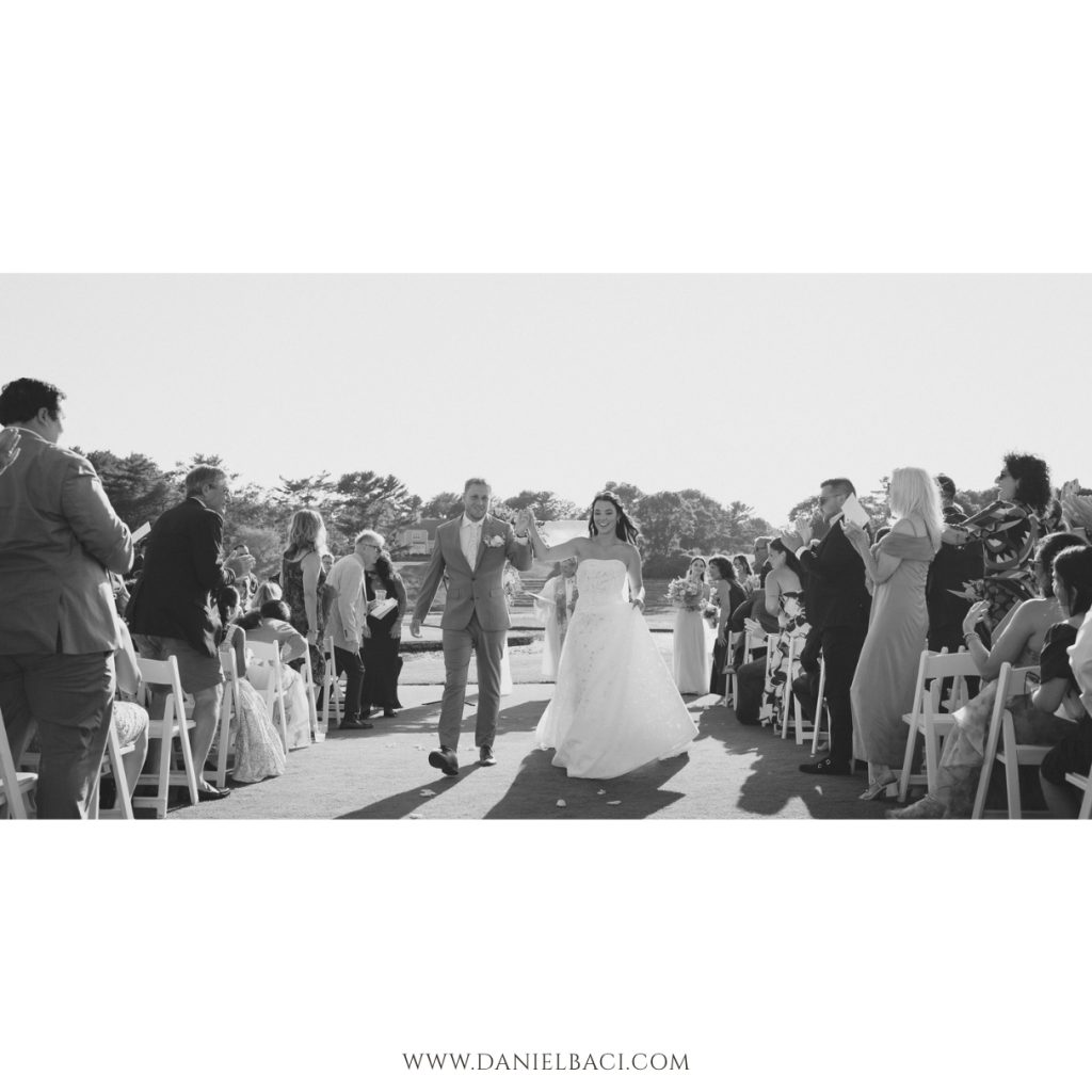 Bride and groom celebrate their married, walking down the aisle as husband and wife at the Willowbend Country Club on Cape Cod.