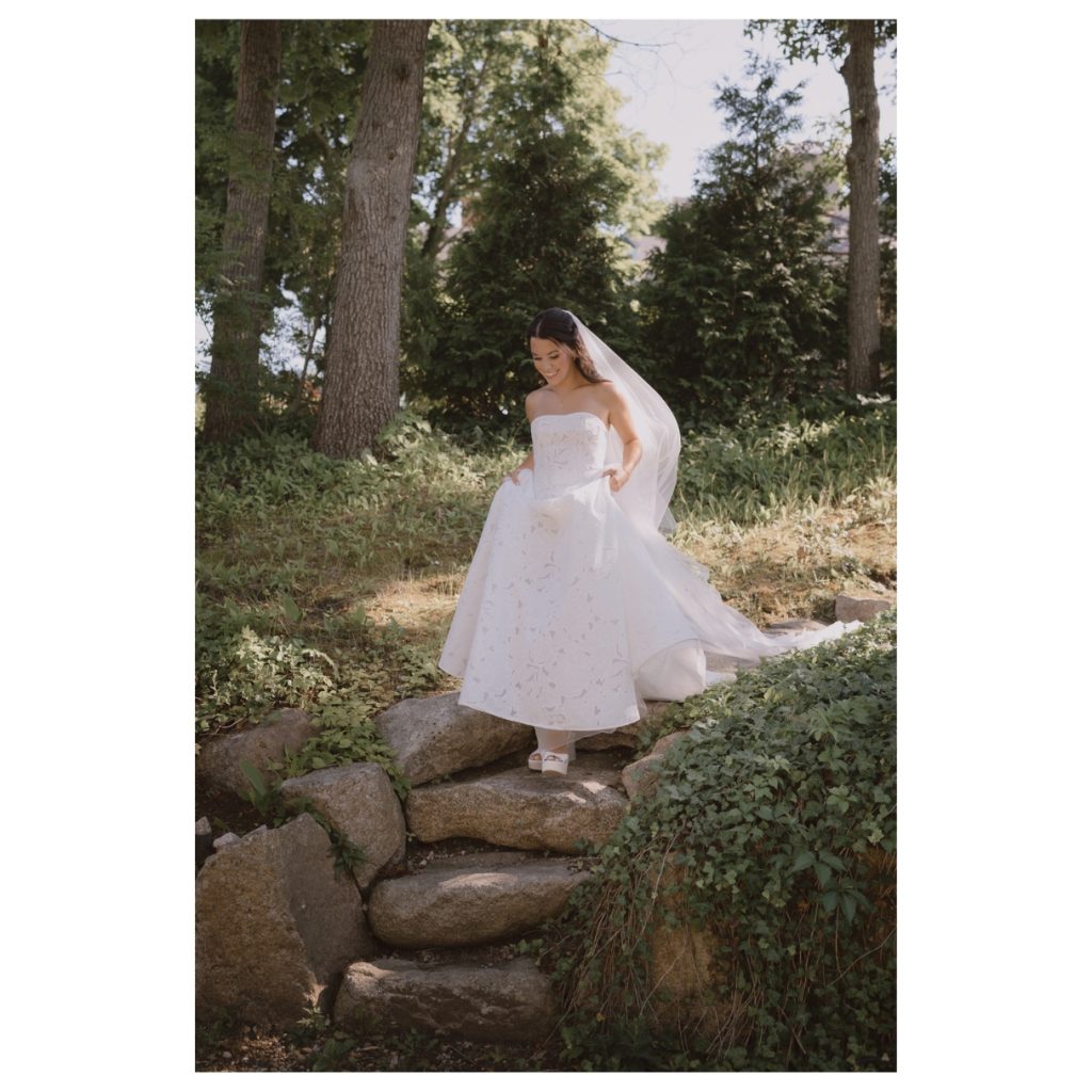 Photo of a bride making her way to the wedding venue in Mashpee, Cape Cod.
