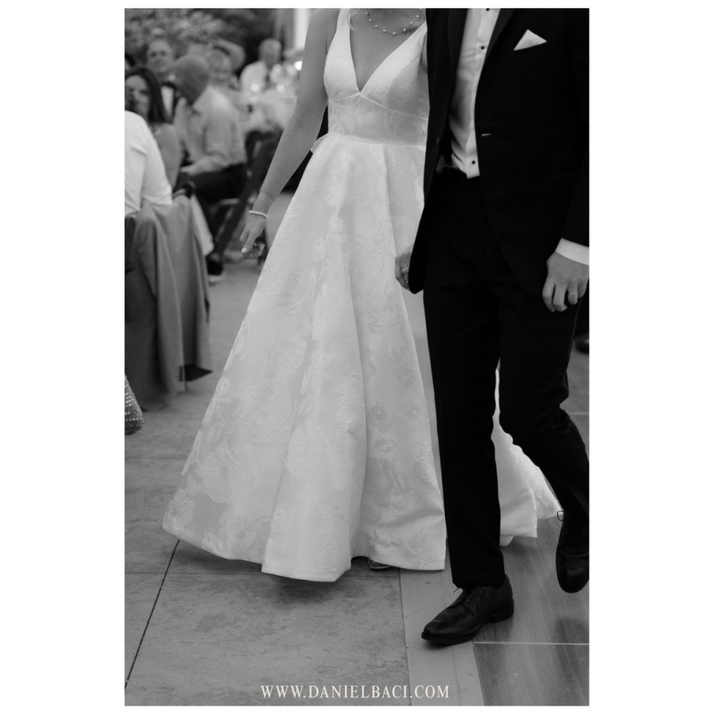 Candid black & white photo of wedding couple
