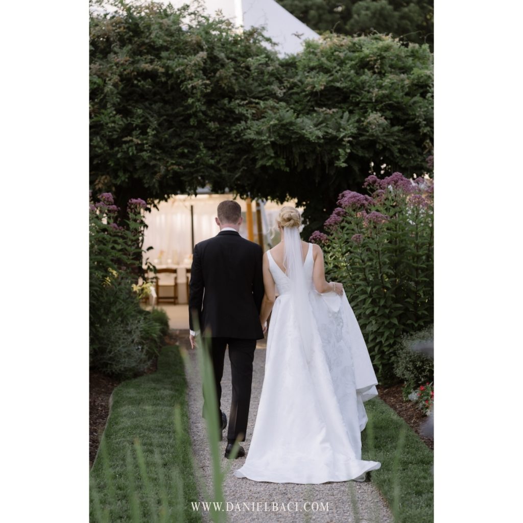 Bride and groom exit ceremony at Glen Magna Farms luxury wedding venue in Danvers.