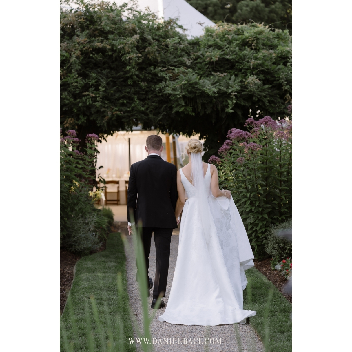 Bride and groom exit ceremony at Glen Magna Farms luxury wedding venue in Danvers.