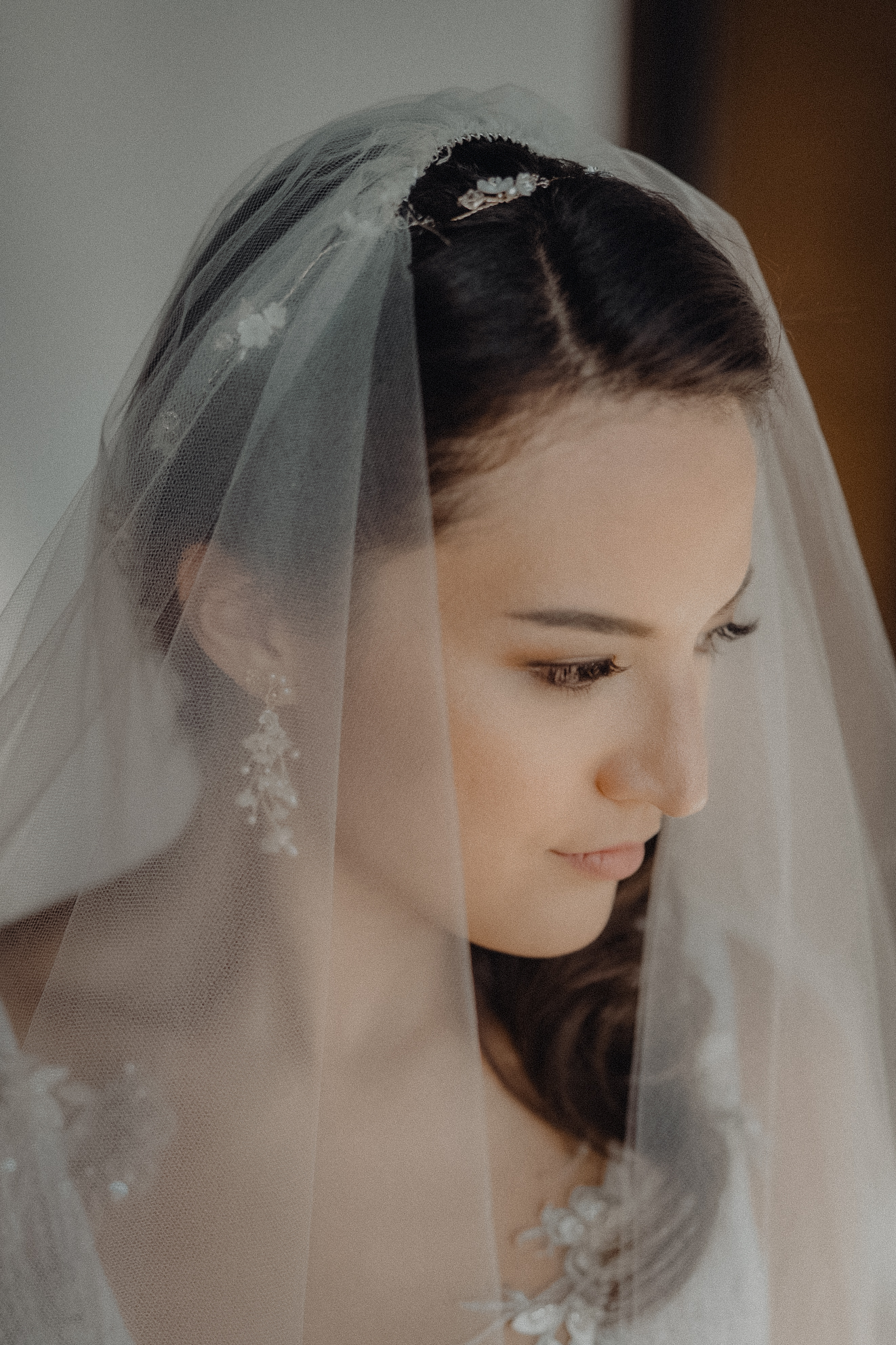 brides portrait wearing veil